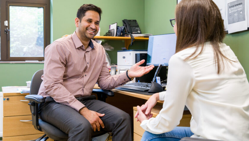 GP talking with patient in NHS Essex clinic